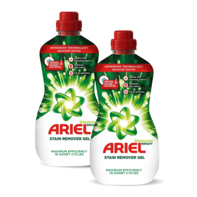 Two Ariel stain remover gel bottles (Diamond Bright) side by side with green star logo and red caps, advertising stain removal.