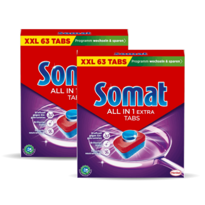 Two red boxes of Somat All in 1 Extra Tabs dishwasher tabs, overlapping with yellow advertising band at top reading XXL 63 TABS and green promo strip, brand name visible